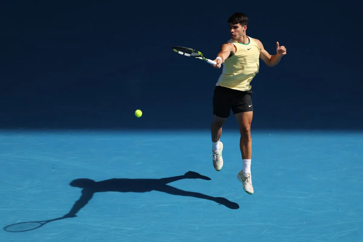 Carlos Alcaraz of Spain plays a forehand in their round three singles match against Juncheng Shang of China during the 2024 Australian Open at Melbourne Park in Melbourne, Australia, on January 20, 2024. (Phil Walter/Getty Images)