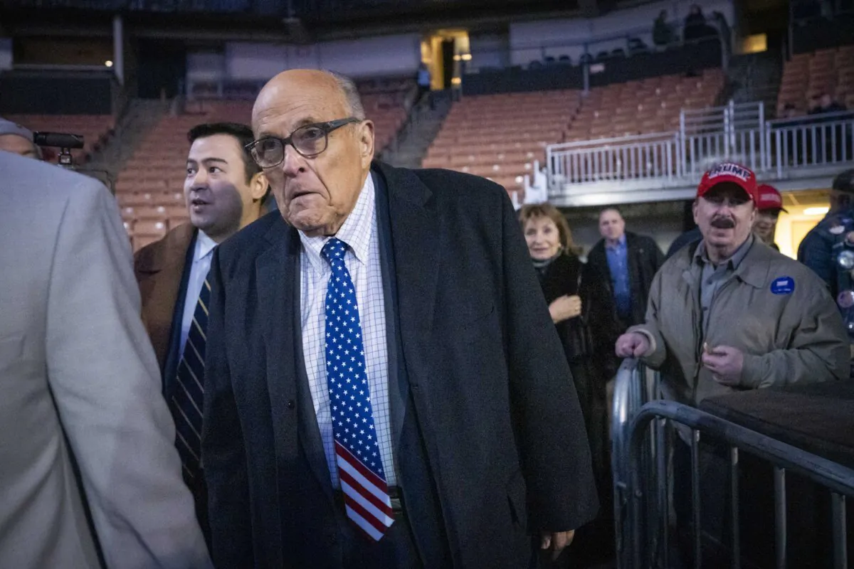 Rudy Giuliani attends Republican presidential candidate and former President Donald J. Trump’s rally in Manchester, N.H., on Jan. 20, 2024. (Madalina Vasiliu/The Epoch Times)