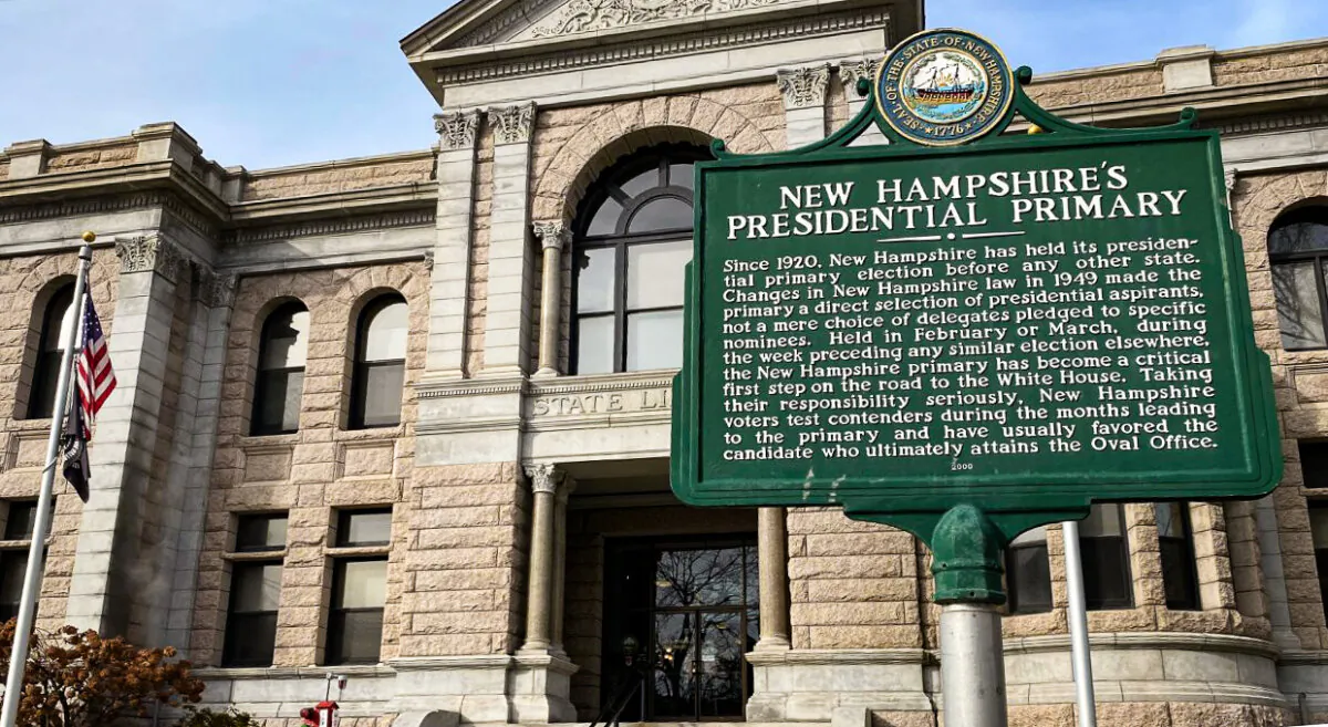 A large plaque commemorating New Hampshire's historic  rank as hosting the first presidential primary in the country stands outside the New Hampshire state library (Alice Giordano/The Epoch Times)