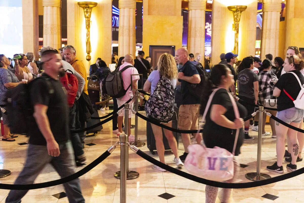 Hotel guests wait in line as they check in at Luxor hotel-casino, on Sept. 14, 2023, in Las Vegas. (Bizuayehu Tesfaye/Las Vegas Review-Journal/TNS)