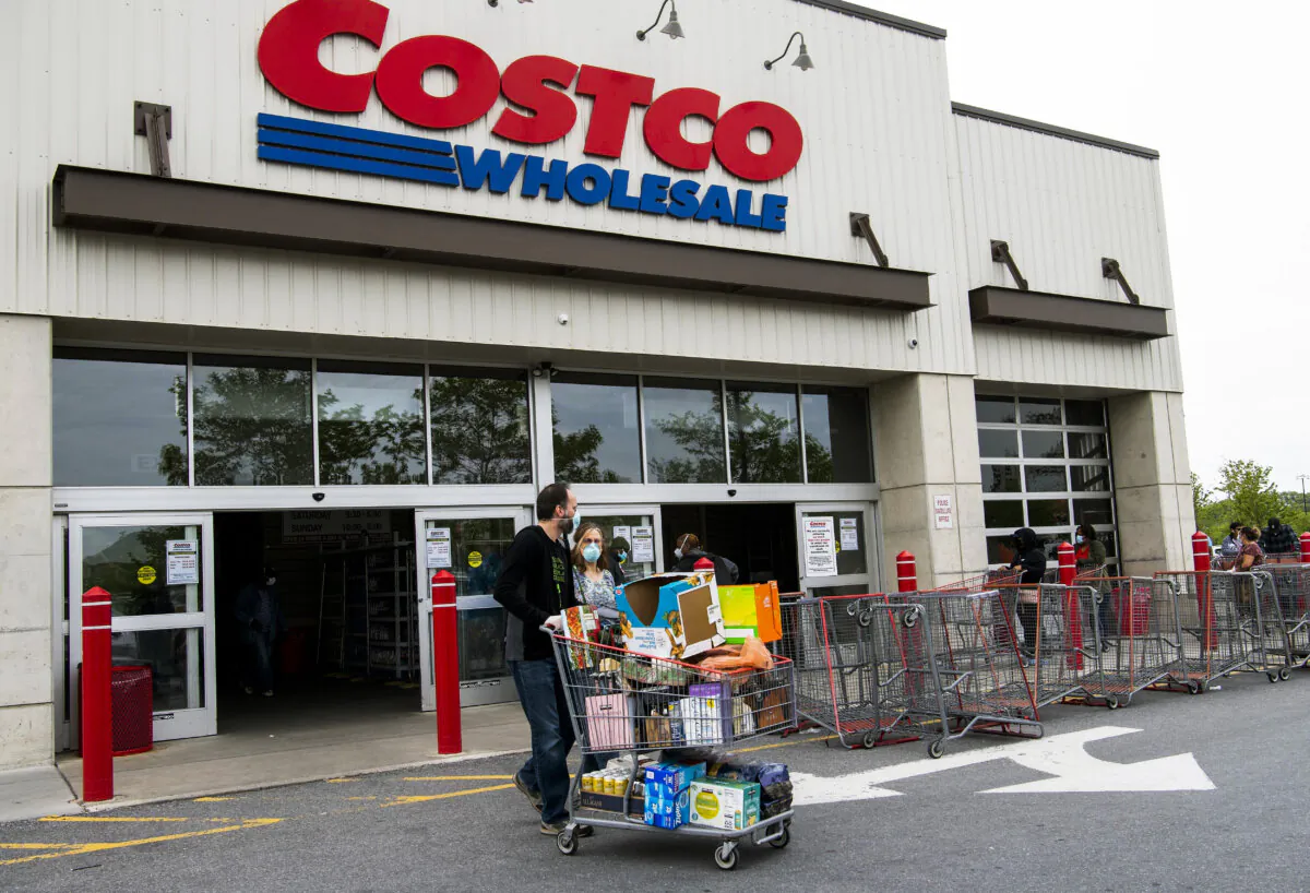 Shoppers exit a Costco store in Washington on May 5, 2020. (Nicholas Kamm/AFP via Getty Images)