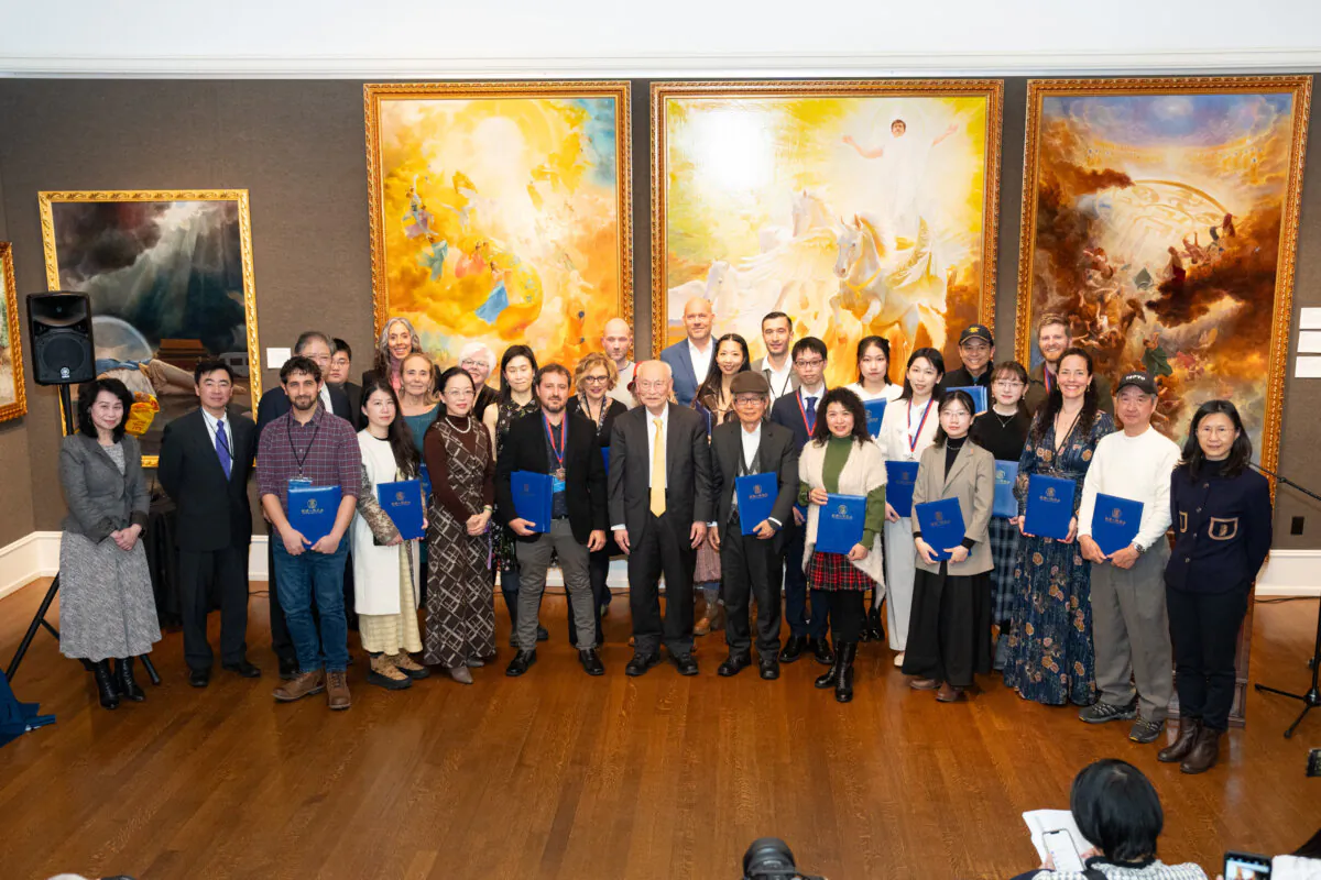 Some winners of the 6th NTD International Figure Painting Competition, with organizers and guests at the Salmagundi Club in New York City on Jan. 18, 2024. (Larry Dye/The Epoch Times)