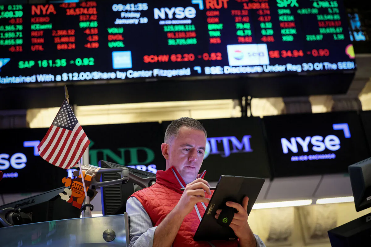 A trader works on the floor at the New York Stock Exchange in New York City, on Jan. 19, 2024. (Brendan McDermid/Reuters)