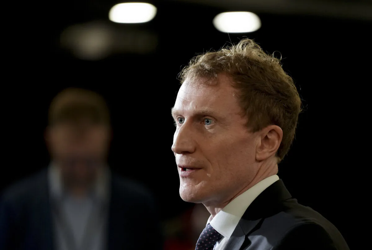 Minister of Immigration, Refugees and Citizenship Marc Miller speaks to the media during the federal cabinet retreat in Montreal, Jan. 22, 2024. (The Canadian Press/Christinne Muschi)