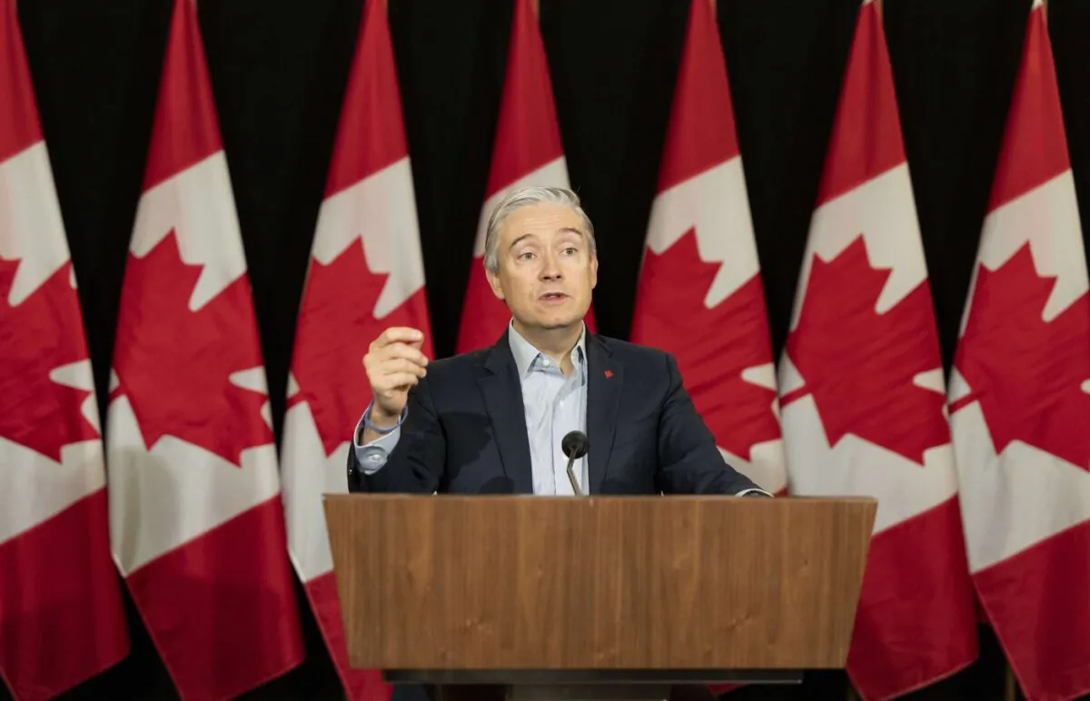 Minister of Innovation, Science and Industry Francois-Philippe Champagne speaks to the media during the federal cabinet retreat in Montreal, on Jan. 22, 2024. (The Canadian Press/Christinne Muschi)