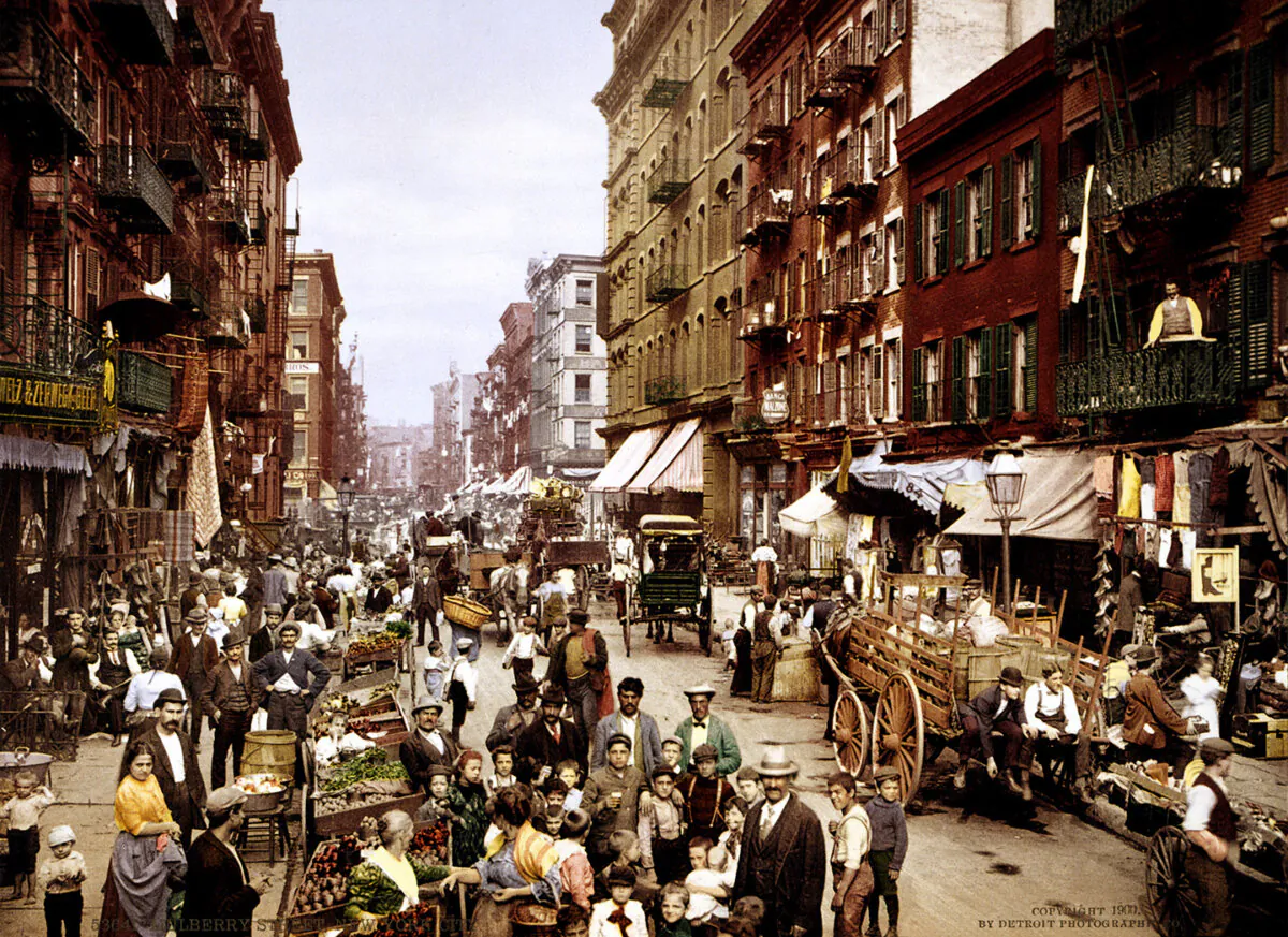 A colorized photograph of Mulberry Street, New York City, circa 1900. Library of Congress. (Public Domain)