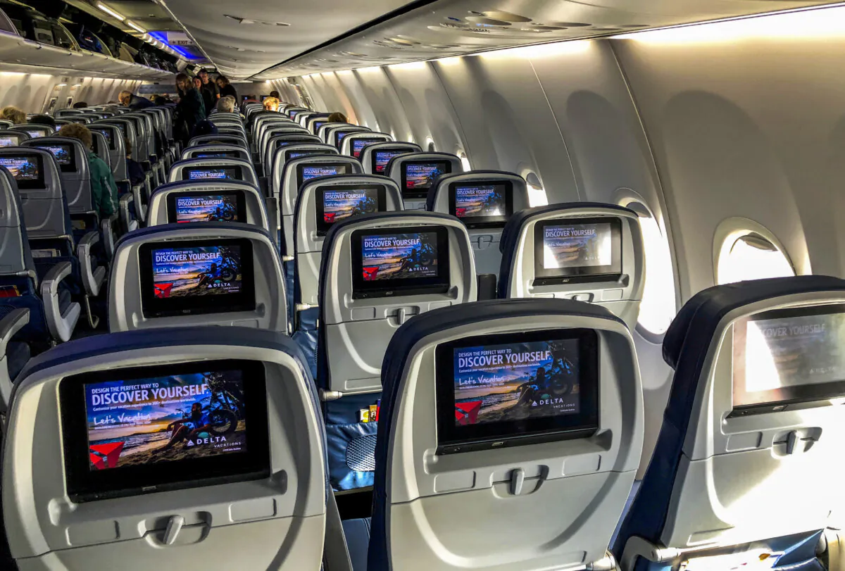 Video screens built into the backs of passenger seats on board a Delta Airlines Boeing 737-900ER aircraft in San Diego, on Jan. 10, 2018. REUTERS/Mike Blake/File Photo