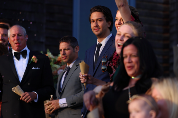crowd at a wedding reception in WHICH BRINGS ME TO YOU 