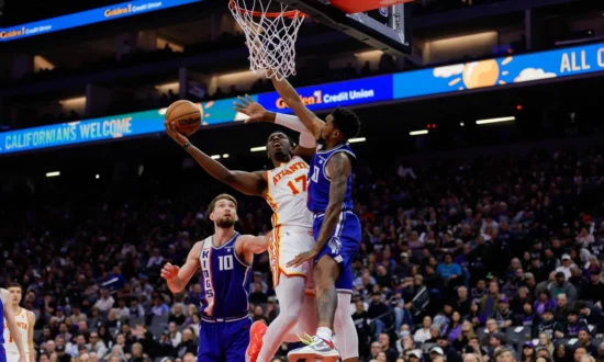 Kings Rough up Trae Young-Less Hawks