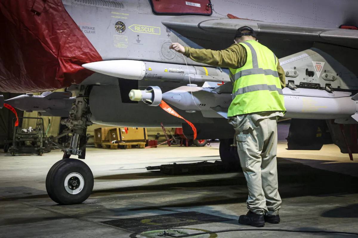 Undated photo of RAF armorers preparing a Royal Air Force Typhoon FGR4. (Leah Jones/MoD/Crown Copyright/PA Wire)