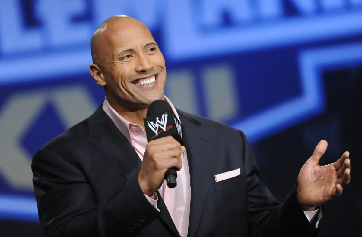 Actor and former WWE Superstar Dwayne "The Rock" Johnson participates in a Wrestlemania XXVII press conference at the Hard Rock Cafe in Times Square, New York, on March 30, 2011. (Evan Agostini/AP Photo)