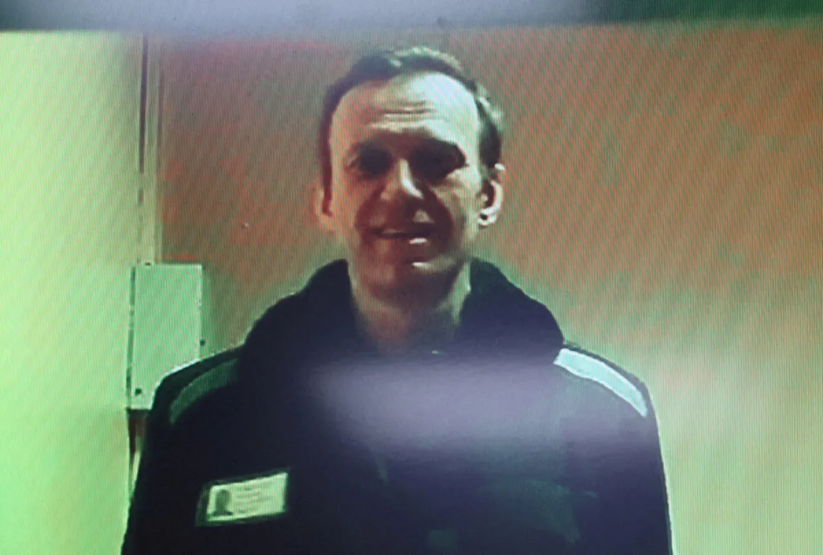 Russian opposition leader Alexei Navalny on a screen via video link from a penal colony in the Vladimir Region during a hearing at the Basmanny district court in Moscow on April 26, 2023. (Yulia Morozova/Reuters)