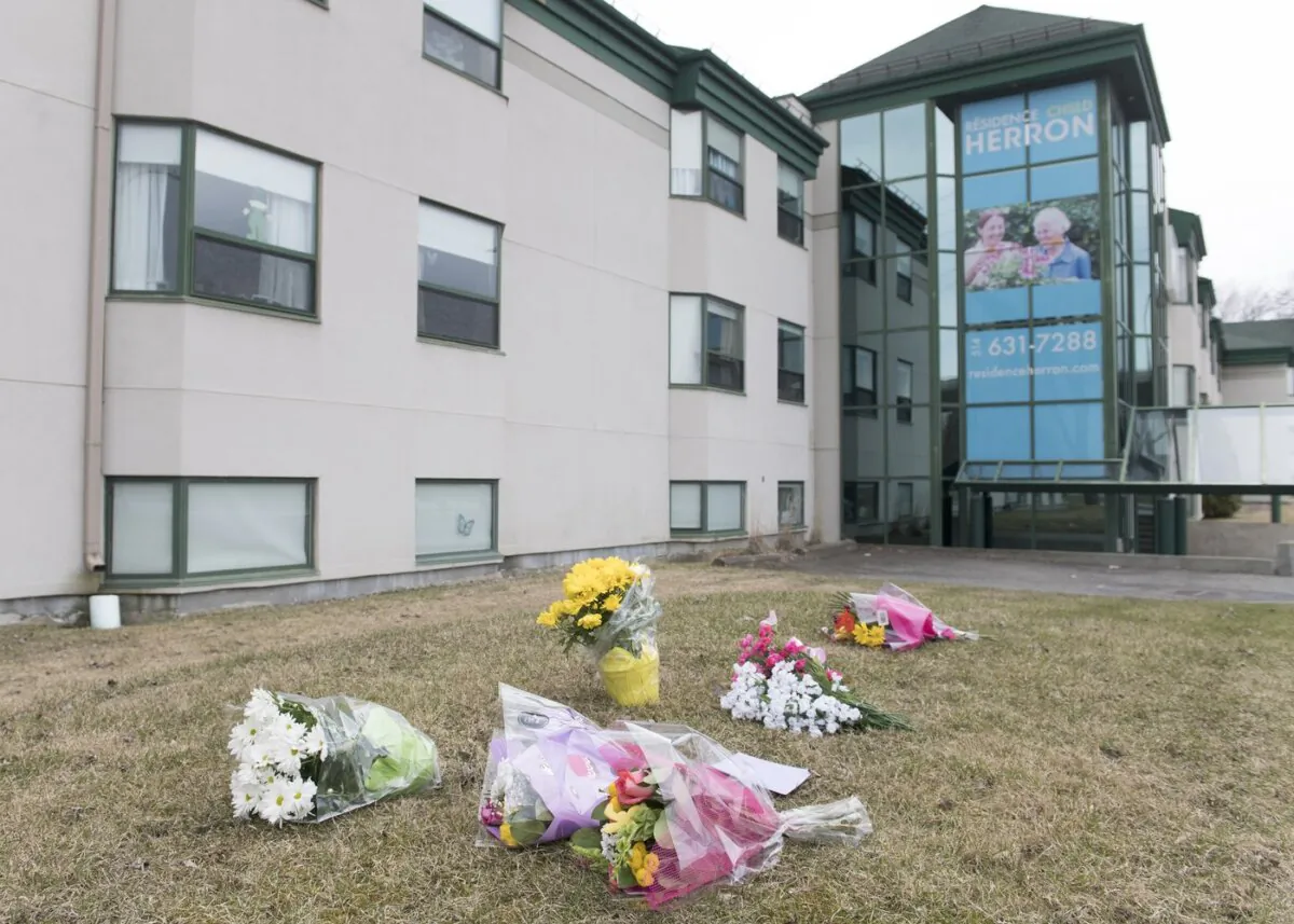 Flowers are shown outside Maison Herron, a long-term care home in the Montreal suburb of Dorval on April 12, 2020. (The Canadian Press/Graham Hughes)