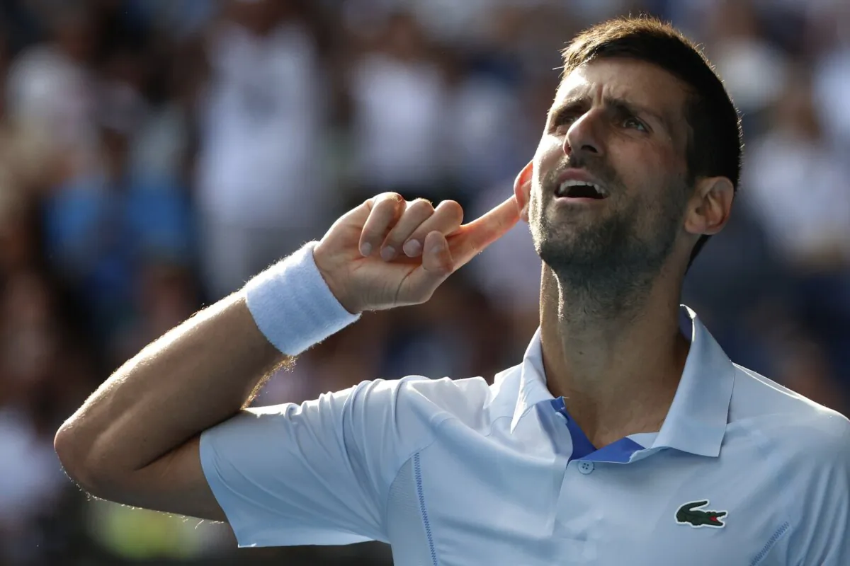 Novak Djokovic of Serbia reacts during his quarterfinal against Taylor Fritz of the U.S. at the Australian Open tennis championships at Melbourne Park in Melbourne, Australia, on Jan. 23, 2024. (Asanka Brendon Ratnayake/AP Photo)