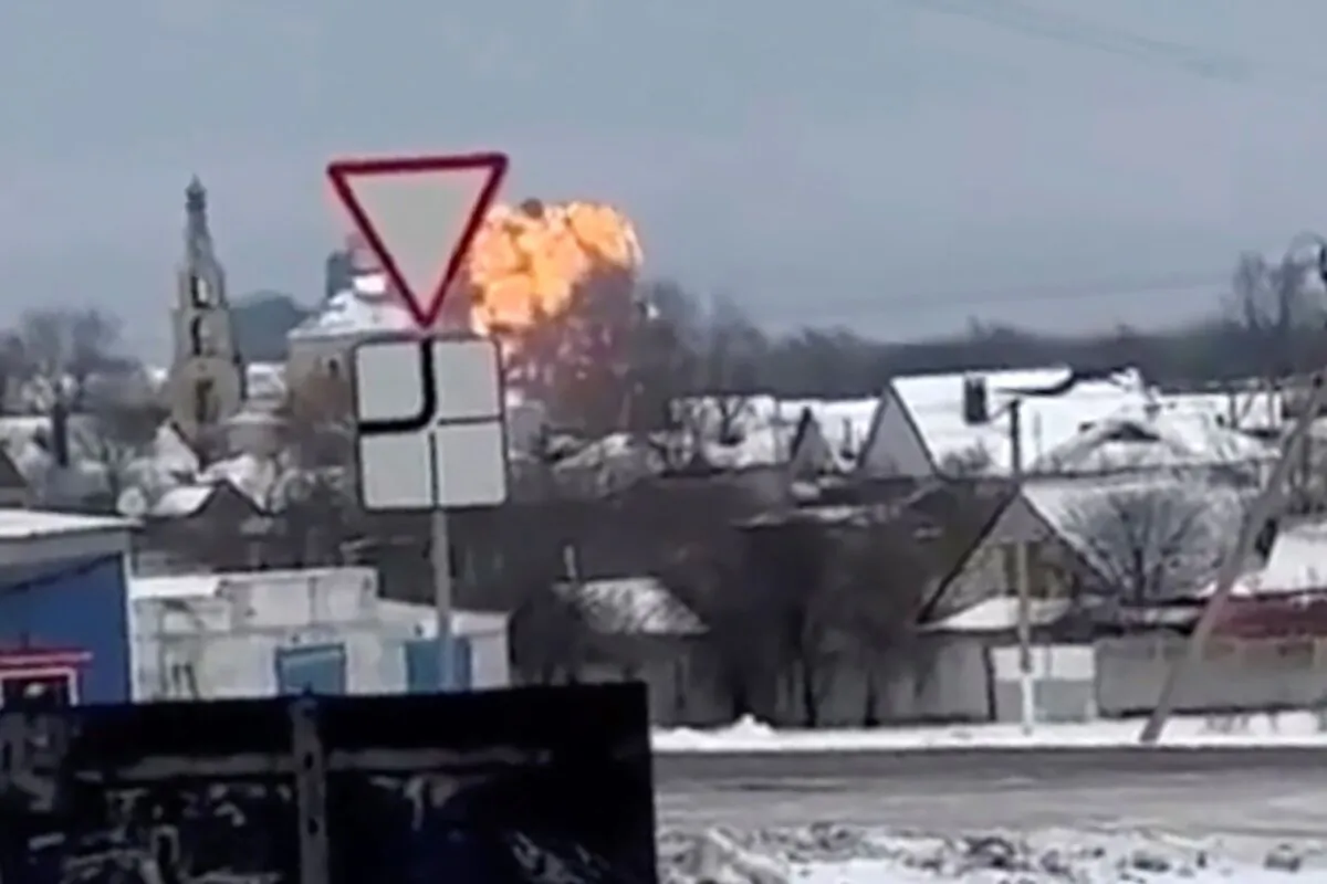 This handout photo show flames rising from the scene of a warplane crash at a residential area near Yablonovo, Belgorod region, on Jan. 23, 2024. (Validated UGC video via AP)