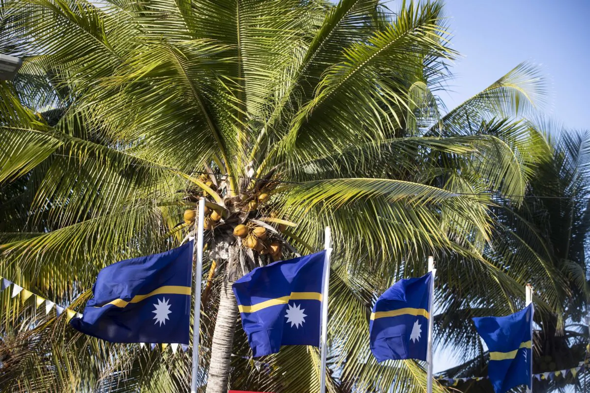 National flags in Nauru for the Pacific Islands Forum on the tiny Pacific nation of Nauru on Sept. 3, 2018. (Jason Oxenham/Pool Photo via AP)