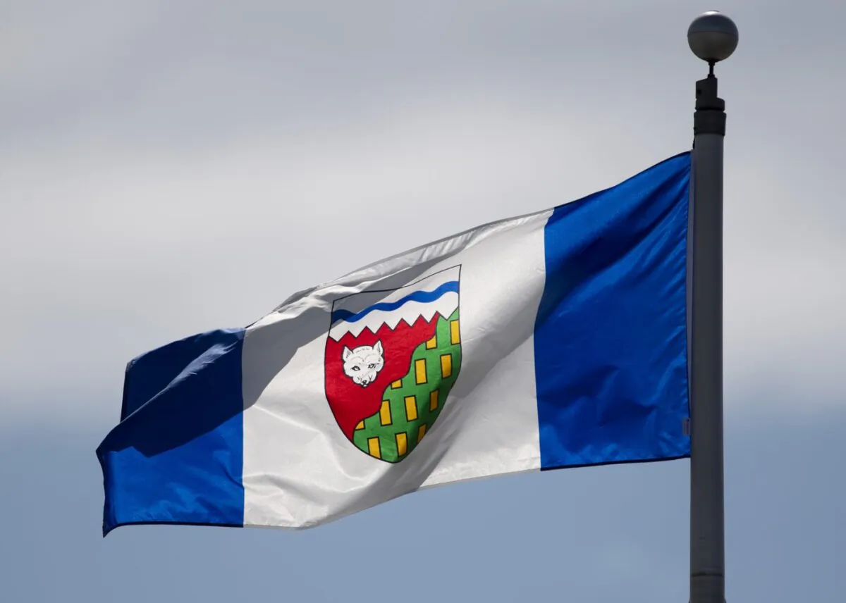 The Northwest Territories flag flies on a flag pole in Ottawa on June 30, 2020. (The Canadian Press/Adrian Wyld)