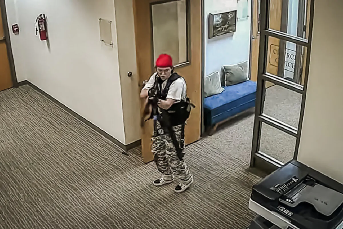 Audrey Hale points a gun inside the Covenant School in Nashville, Tenn., on March 27, 2023. (Nashville Police Department via The Epoch Times)