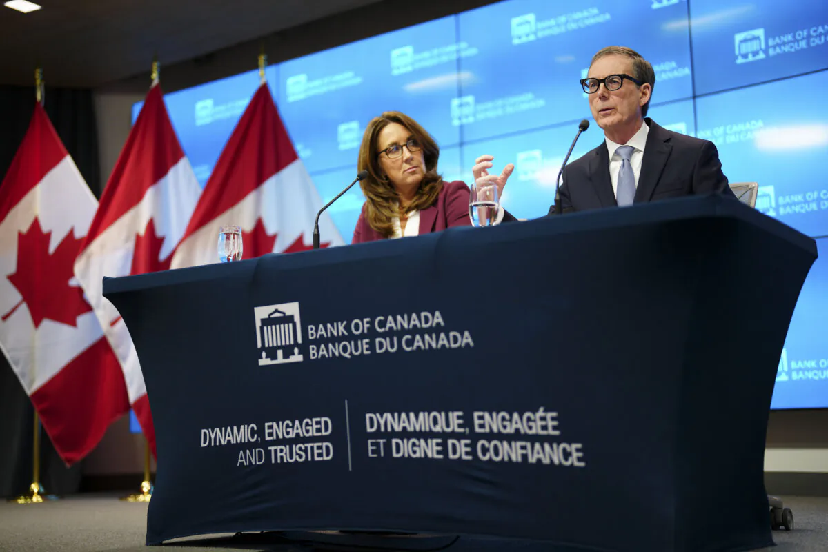 Bank of Canada governor Tiff Macklem and senior deputy governor Carolyn Rogers hold a press conference at the central bank in Ottawa on Jan. 24, 2024. (The Canadian Press/Sean Kilpatrick)
