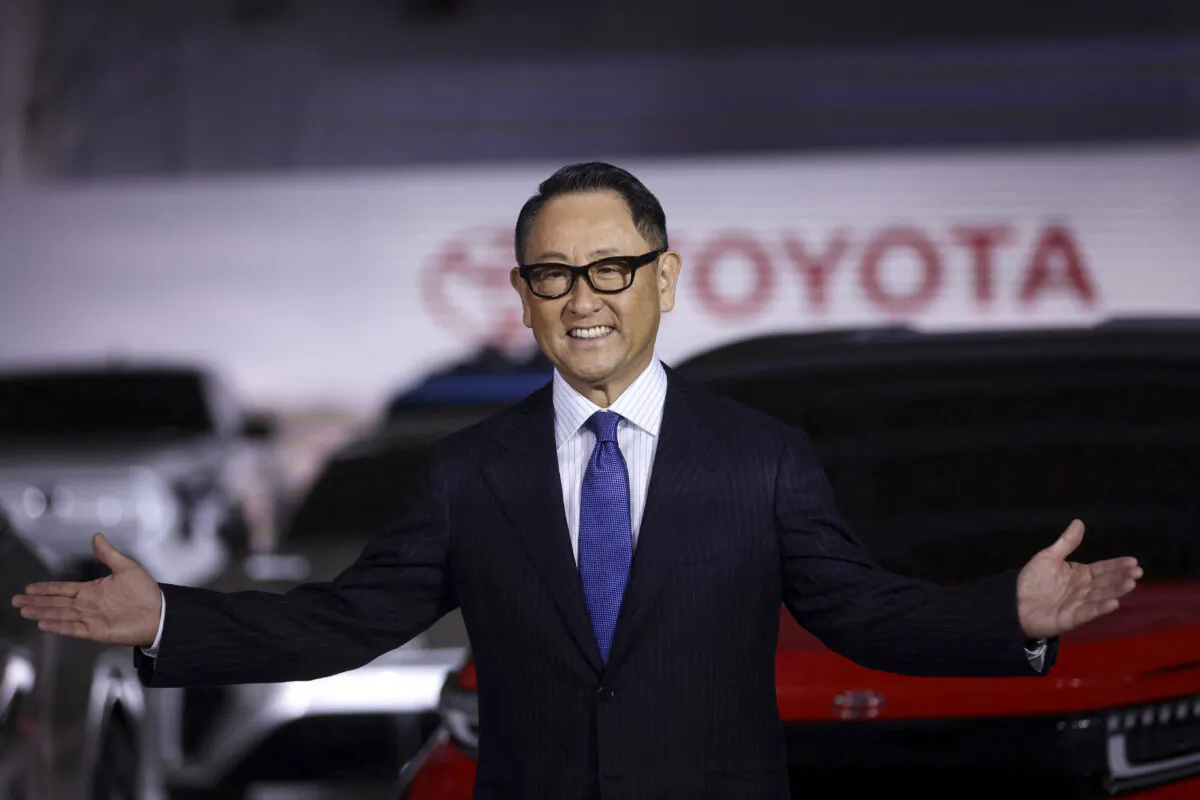 Toyota president Akio Toyoda gestures at a briefing on EV (electric vehicle) battery strategies at the companys showroom in Tokyo on December 14, 2021. (Photo by Behrouz MEHRI / AFP) (Photo by BEHROUZ MEHRI/AFP via Getty Images)