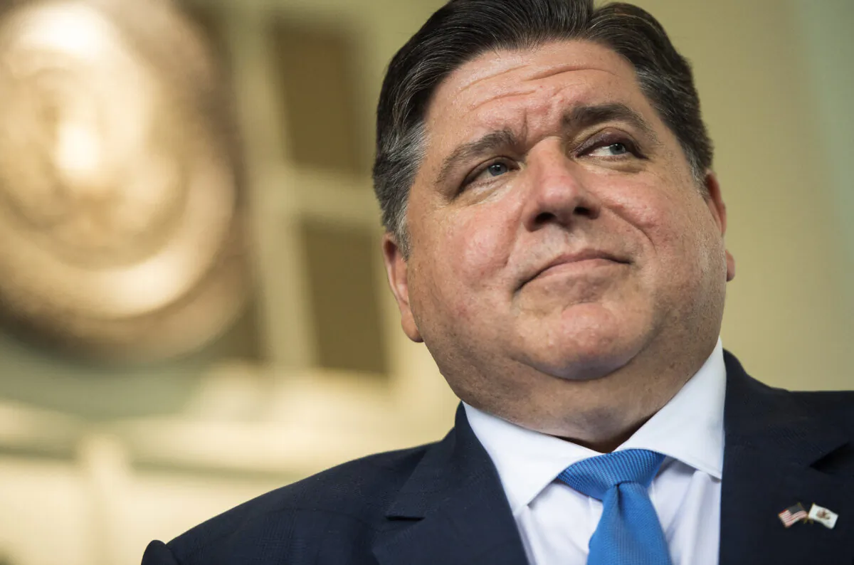 Governor JB Pritzker of Illinois, speaks  to the media outside of the West Wing of the White House in Washington, DC, July 14, 2021, after meeting with US President Joe Biden about the administration's infrastructure plan. (Photo by SAUL LOEB / AFP) (Photo by SAUL LOEB/AFP via Getty Images)