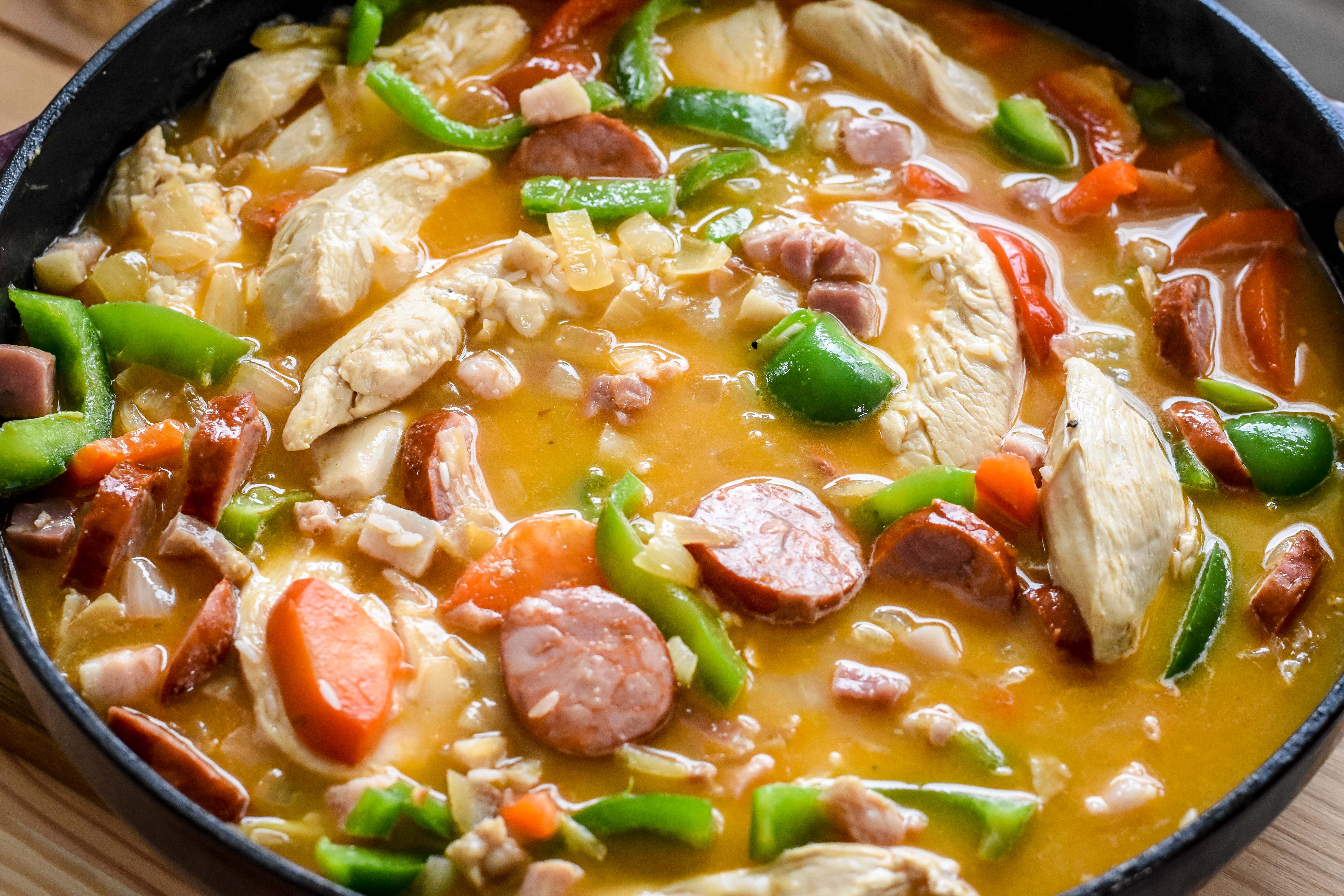 Add chicken stock a little bit at a time, waiting for it to be fully absorbed between additions. (Audrey Le Goff)