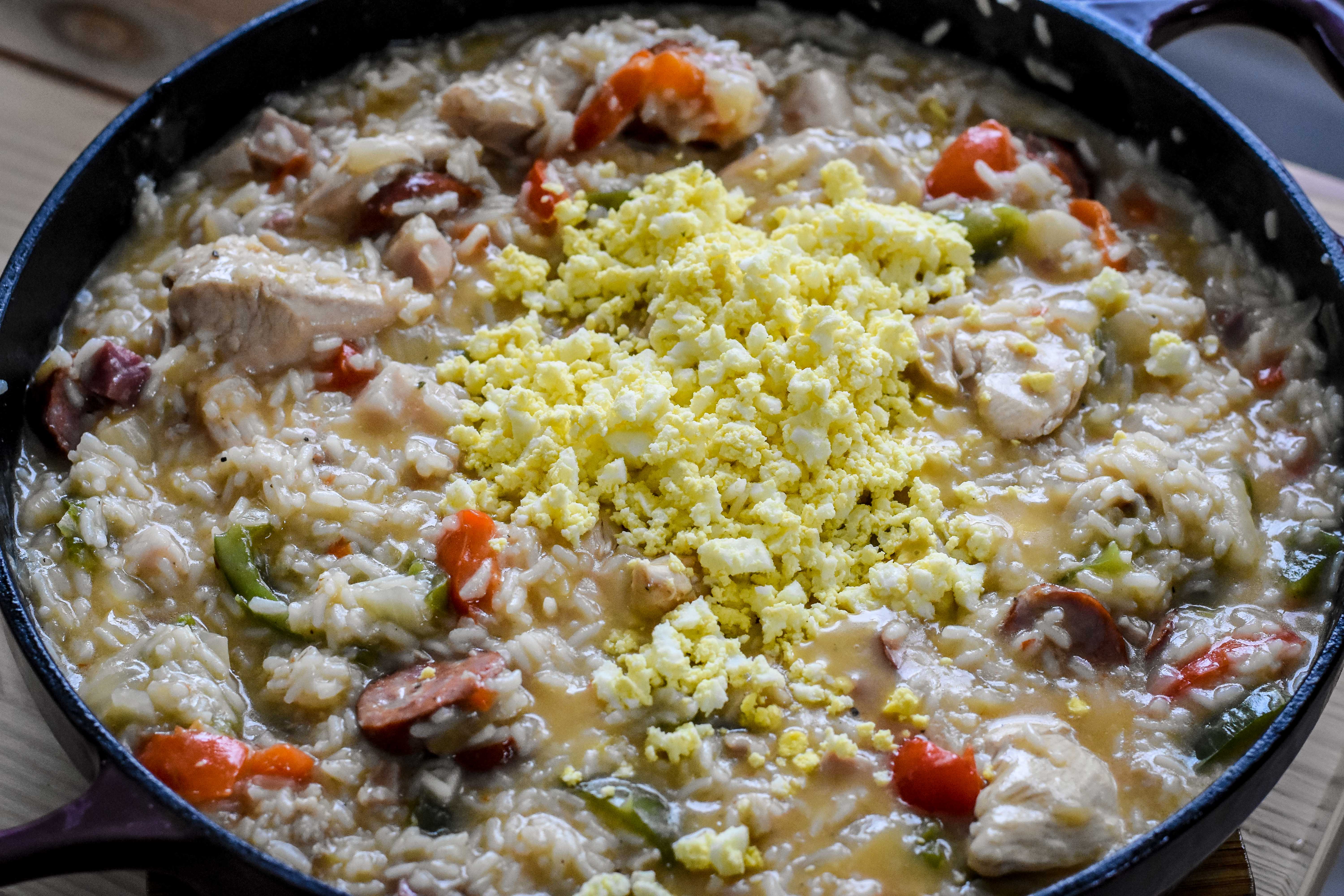 Crumble the hard-boiled eggs with the back of a fork and stir them into the rice. (Audrey Le Goff)