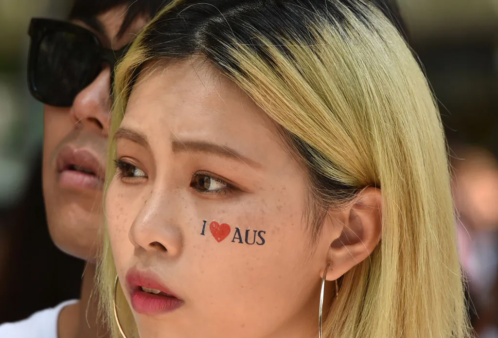 Onlookers watch an "Invasion Day" rally on Australia Day in Melbourne on January 26, 2018.
(PETER PARKS/AFP via Getty Images)