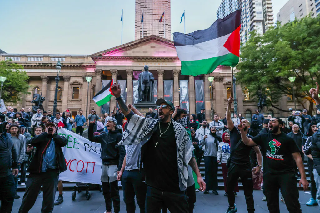Protestors chant and wave the Palestinian flag at a Pro-Palestine rally in Melbourne, Australia, on Oct. 10, 2023. (Asanka Ratnayake/Getty Images)