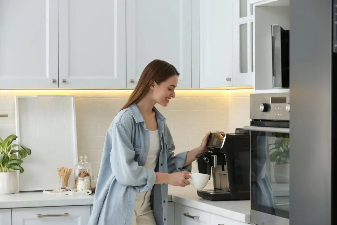 Research has found that drinking one to two cups of coffee daily helps prevent COVID-19 infection. (New Africa/Shutterstock)