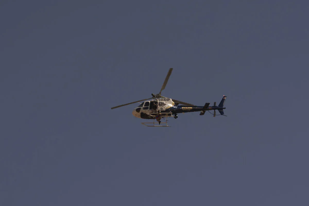A California Highway Patrol helicopter flies in Imperial County, Calif., on Oct. 6, 2022. (Allison Dinner/AFP via Getty Images)