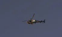 Harrowing Helicopter Rescue Saves Woman Trapped for Hours Atop Overturned Pickup in Swollen Creek
