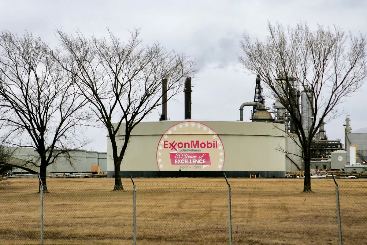 The Exxon Mobil logo is painted on a storage tank at the Exxon Mobil Corp. refinery in Joliet, Ill., on Jan. 30, 2006. (Scott Olson/Getty Images)