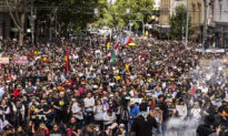 Thousands Rally on Steps of State Parliament During ‘Invasion Day’ Protests