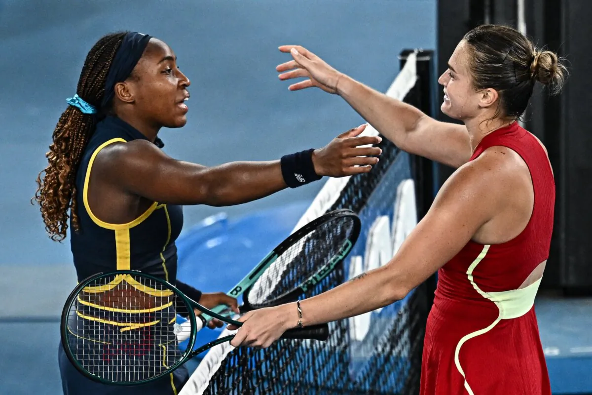 Belarus' Aryna Sabalenka (R) greets USA's Coco Gauff (L) after victory in their women's singles semi-final match on day 12 of the Australian Open tennis tournament in Melbourne on Jan. 25, 2024. (Lillian Suwanrumpha/AFP)