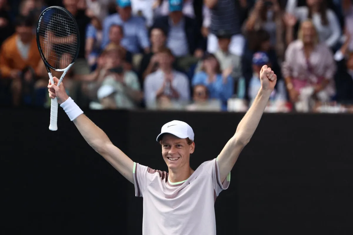 Italy's Jannik Sinner celebrates victory against Serbia's Novak Djokovic during their men's singles semi-final match on day 13 of the Australian Open tennis tournament in Melbourne on Jan. 26, 2024. (David Gray/ AFP)