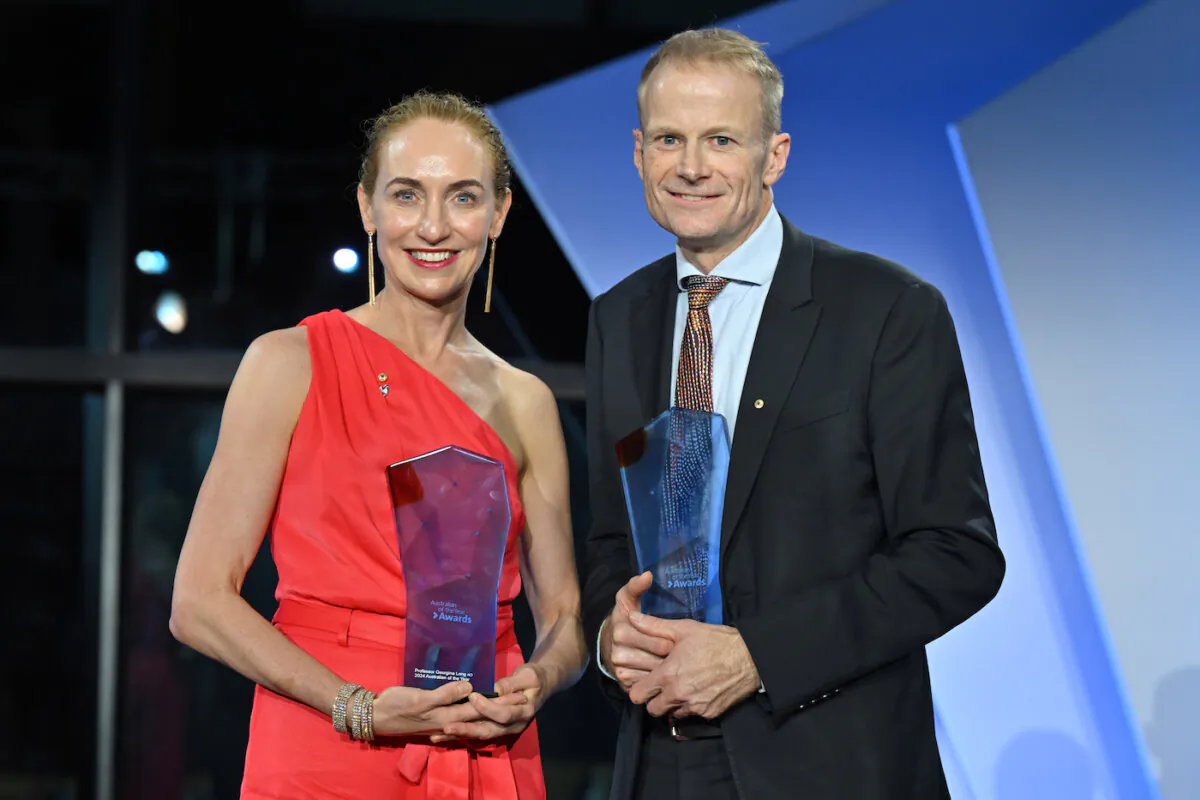 Australians Of The Year Professor Georgina Long and Professor Richard Scolyer pose for photos after the 2024 Australian of the Year Awards at the National Arboretum in Canberra, Jan. 25, 2024. (AAP Image/Mick Tsikas)