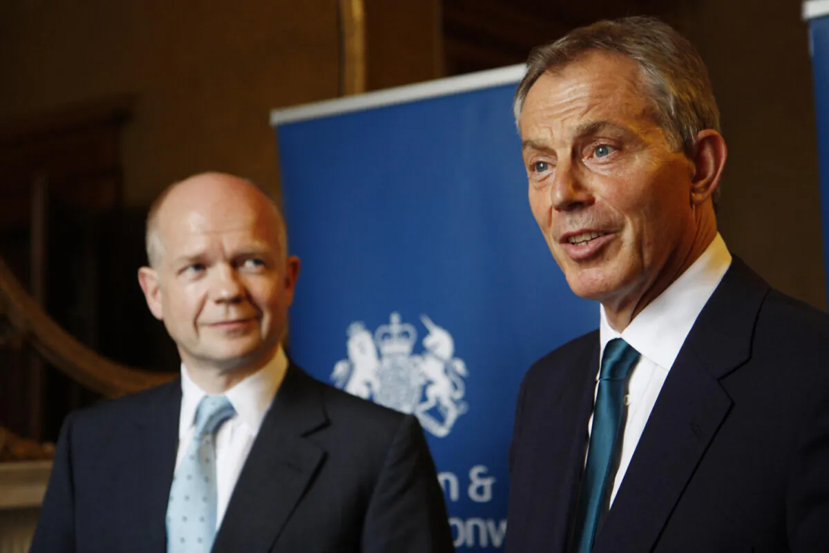 Undated photo of former Foreign Secretary Lord William Hague (L) and former Prime Minister Sir Tony Blair at the Foreign Office in London. (PA)