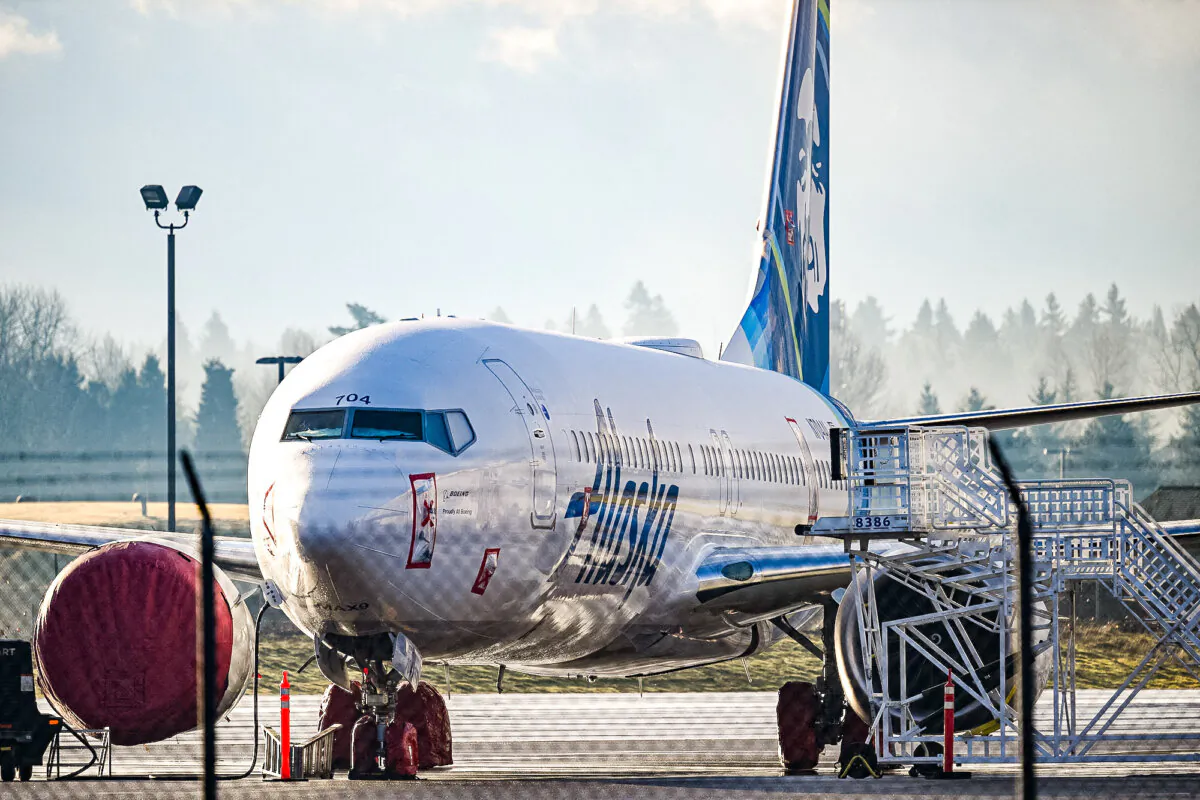 Alaska Airlines N704AL, a 737 Max 9, is parked on the tarmac at Portland International Airport, on January 23, 2024. (Patrick T. Fallon/AFP)