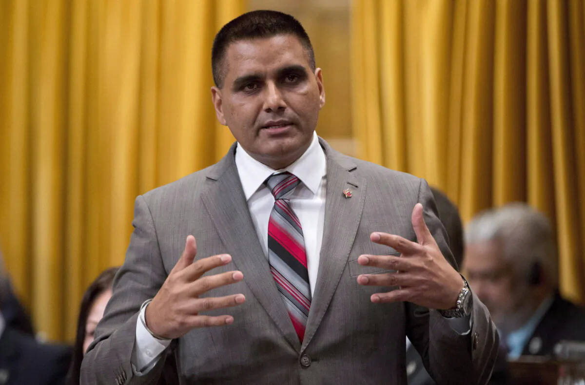 Then-MP Parm Gill responds to a question in the House of Commons in 2014 in Ottawa. Mr. Gill is now seeking re-election in the Milton riding. (Adrian Wyld/The Canadian Press)