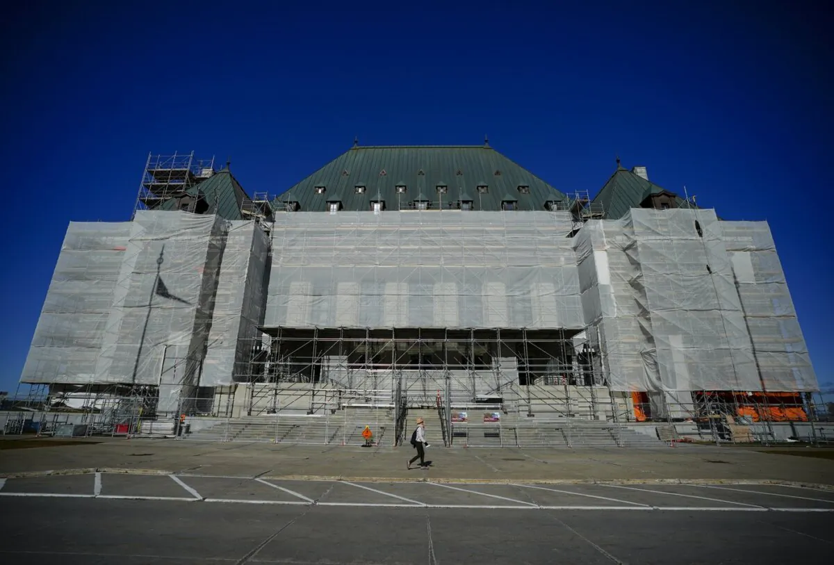 A person walks past the Supreme Court of Canada during construction in Ottawa on Oct. 23, 2023. (The Canadian Press/Sean Kilpatrick)