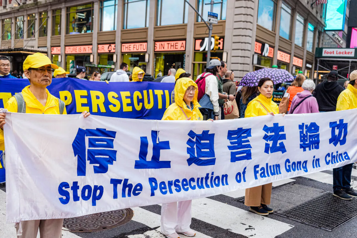 Falun Gong practitioners march in New York City in 2022 to bring awareness of the persecution of Falun Gong practitioners in communist China. (nejc ketis/Shutterstock) 
