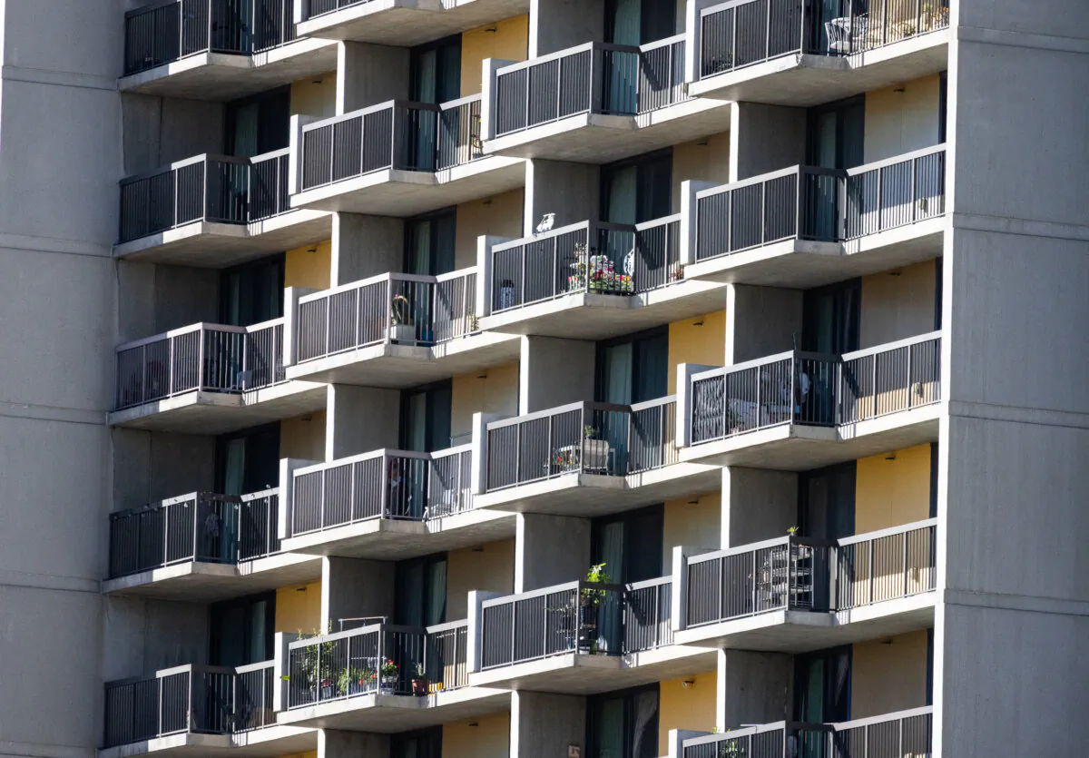 An apartment unit resides next to towering buildings in Los Angeles. Calif., on Jan. 11, 2024. (John Fredricks/The Epoch Times)