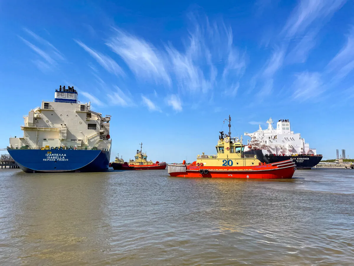 A liquefied natural gas tanker is guided by tug boats at the Cheniere Sabine Pass LNG export unit in Cameron Parish, Louisiana, on April 14, 2022. (Marcy de Luna/Reuters)