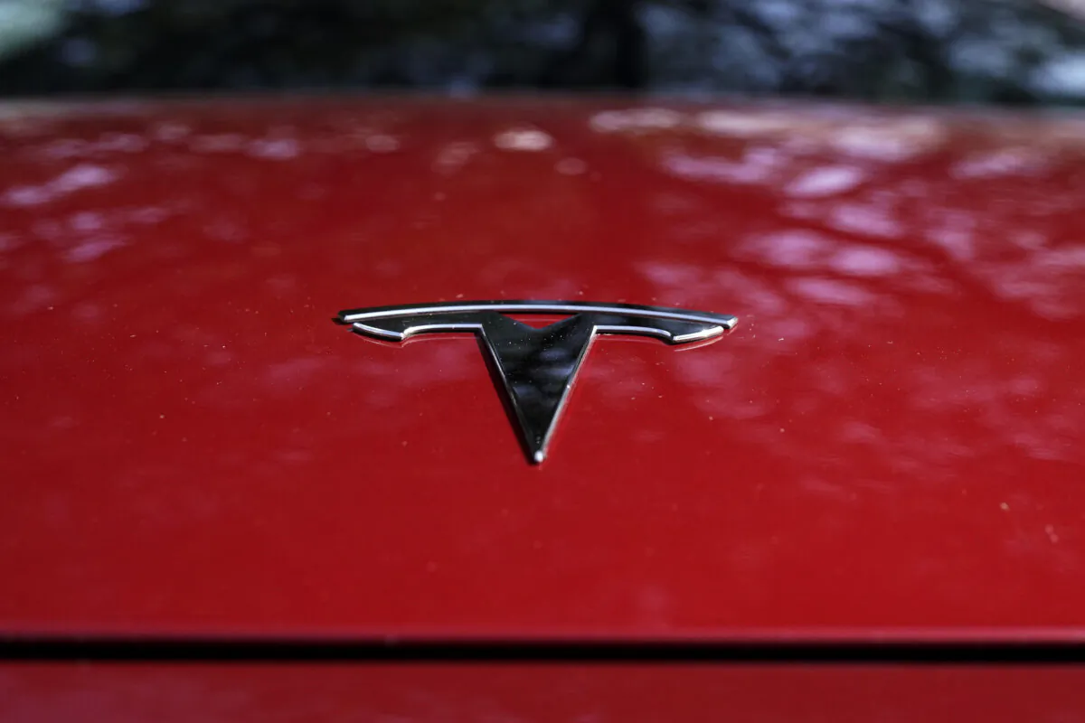 A Tesla logo on a vehicle on display in Austin, Texas on Feb. 22, 2023. (Eric Gay/AP Photo)