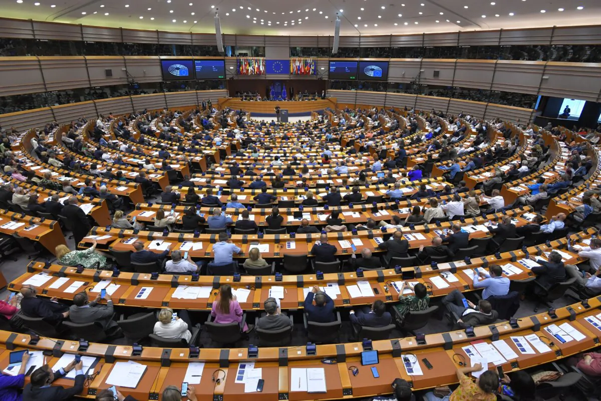 Euro-deputies take part in a vote on the revision of the European Union emissions trading system at the European Parliament in Brussels on June 22, 2022. (John Thys/AFP via Getty Images)
