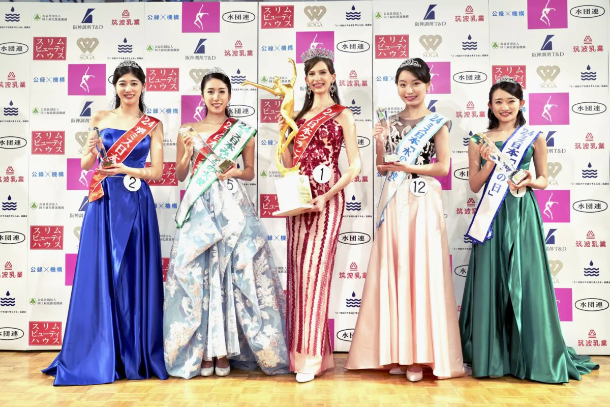 Contestants including Karolina Shiino (C), who won the Miss Nippon (Japan) Grand Prix, pose for a photo after the contest in Tokyo on Jan. 22, 2024. (Miss Nippon Association via AP)