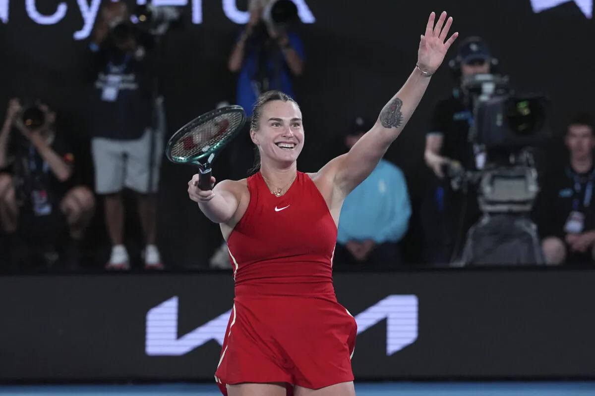 Aryna Sabalenka of Belarus celebrates after defeating Zheng Qinwen of China in the women's singles final at the Australian Open tennis championships at Melbourne Park, Melbourne, Australia, on Jan. 27, 2024. (Andy Wong/AP Photo)