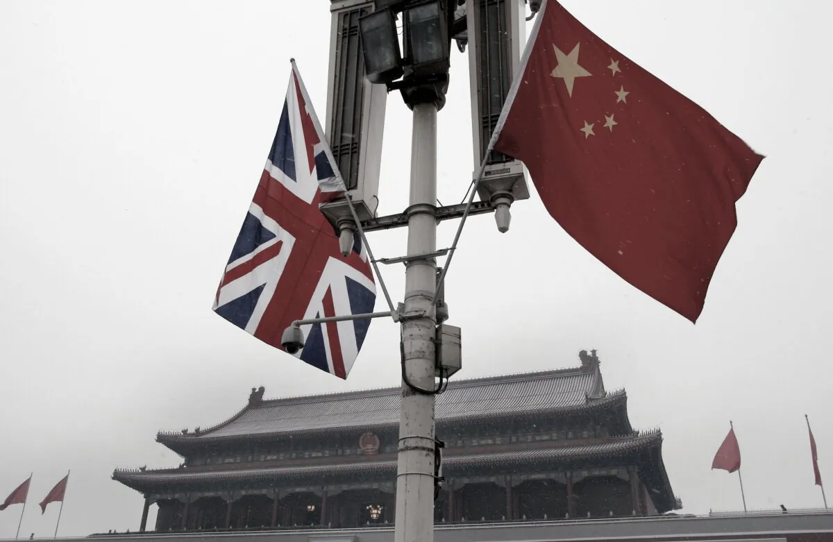 British and Chinese flags are seen on display in front of the Tiananmen Gate in Beijing, on Jan. 17, 2008. (Andy Wong /AP Photo)