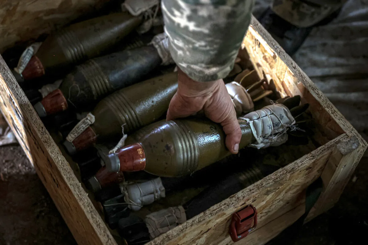 A Ukrainian soldier prepares mortar shells at a position along the front line in the Donetsk region on Sept. 26, 2022, amid Russia's invasion of Ukraine. (Anatolii Stepanov/AFP via Getty Images)